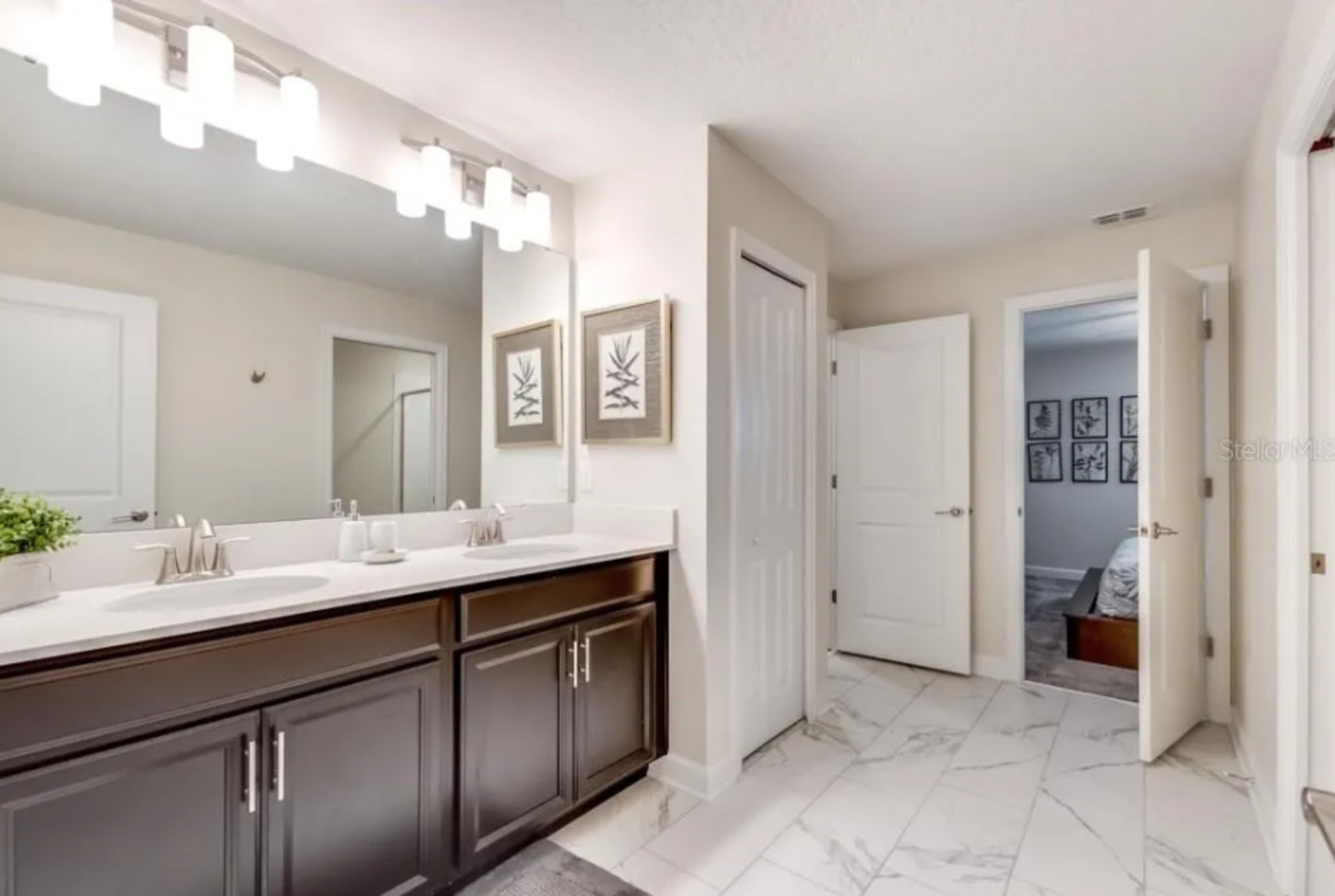 Enjoy the convenience of an en-suite bathroom featuring a walk-in shower for a refreshing start to your day