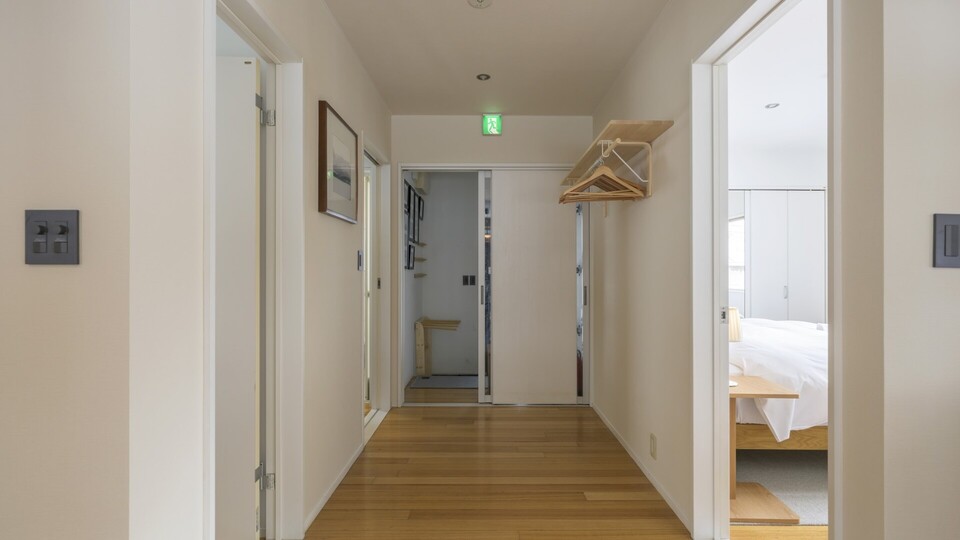 Welcoming entrance and the guest bedroom
