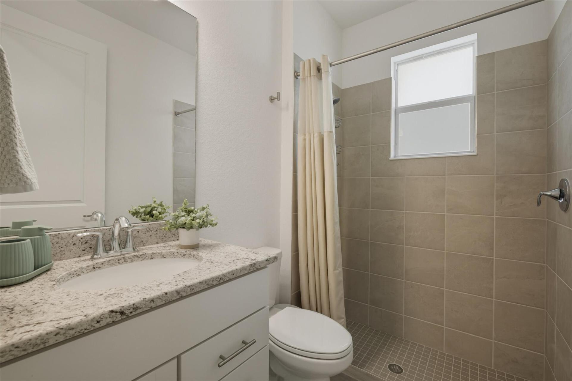 Guest bathroom with walk-in shower