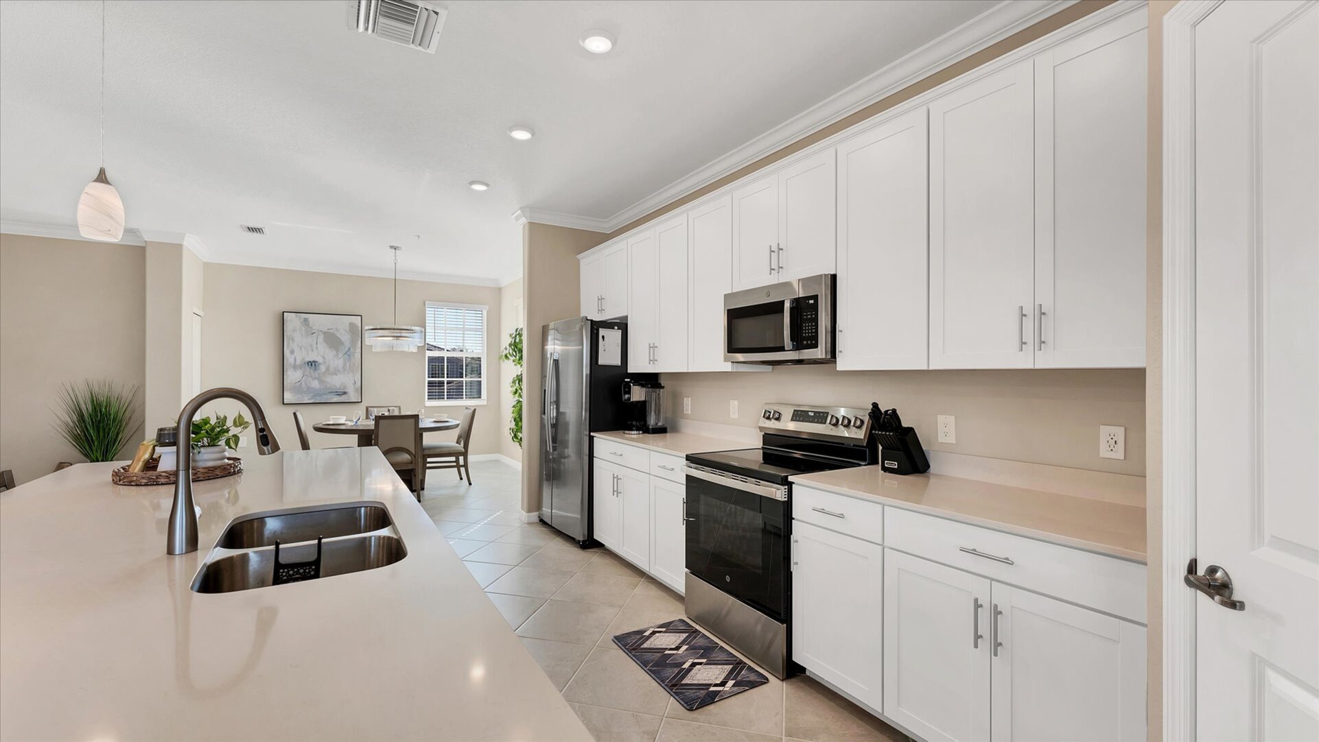 Gorgeous, fully-equipped kitchen with all new appliances and large kitchen island that seats 4