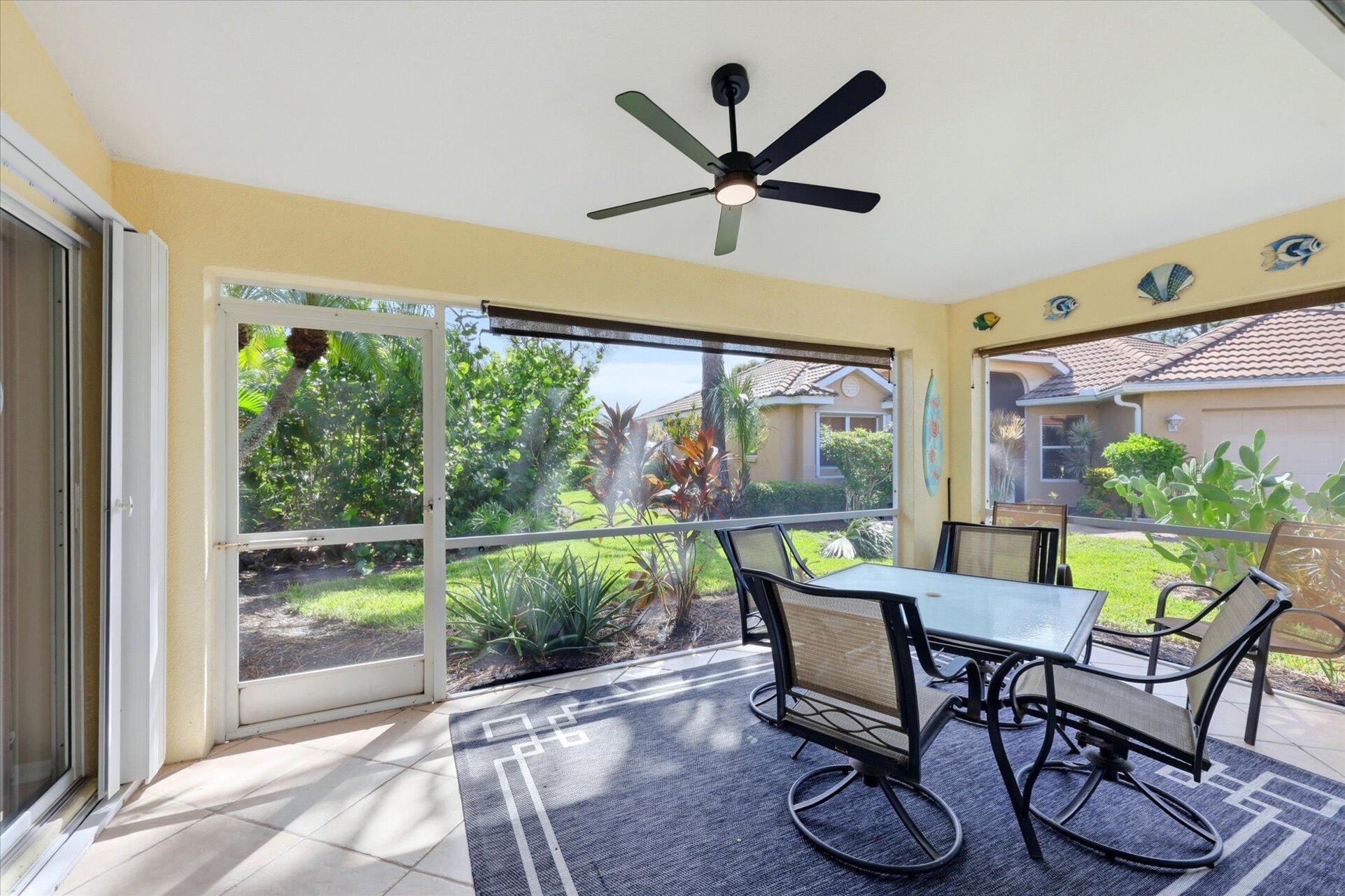 Screend-in patio overlooking lush landscaping