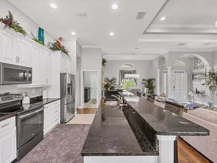 Bright, fully-equipped kitchen with lots of countertop and storage space