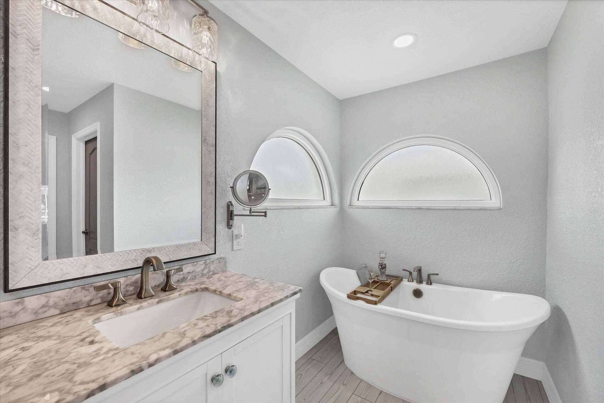 En suite with large walk-in shower, double vanities and soaking tub