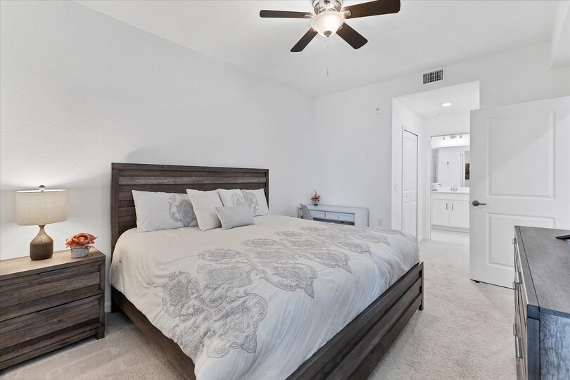Bedroom 1 with king bed, ensuite, and 42-inch Smart TV