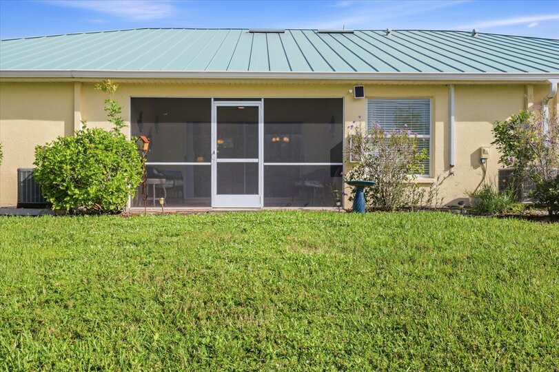 Screened-in patio overlooking the pond. No rear neighbors