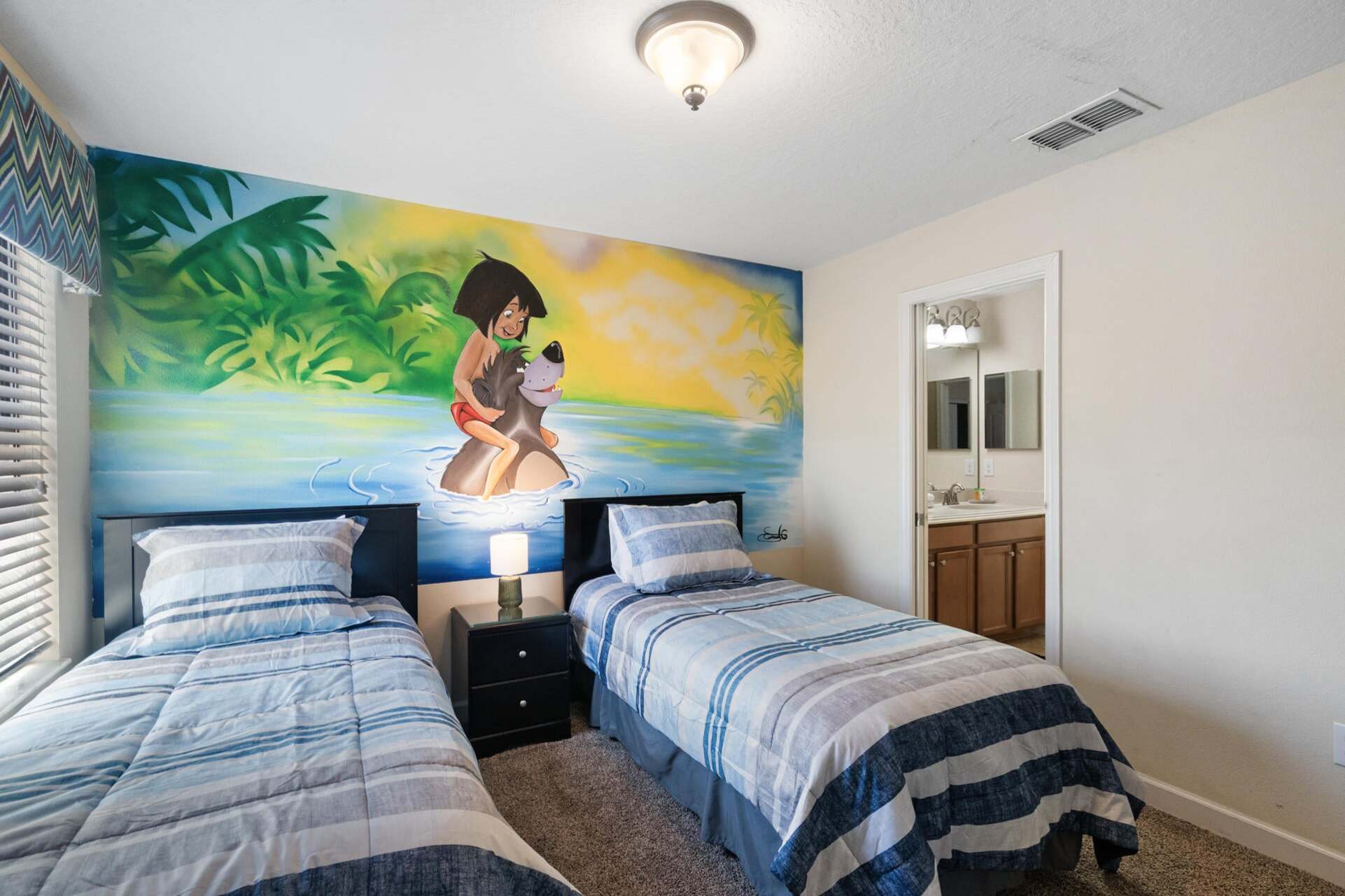 Two Twins Bedroom Upstairs 6 Shared Bathroom 
32" Roku TV
Jungle Book Theme