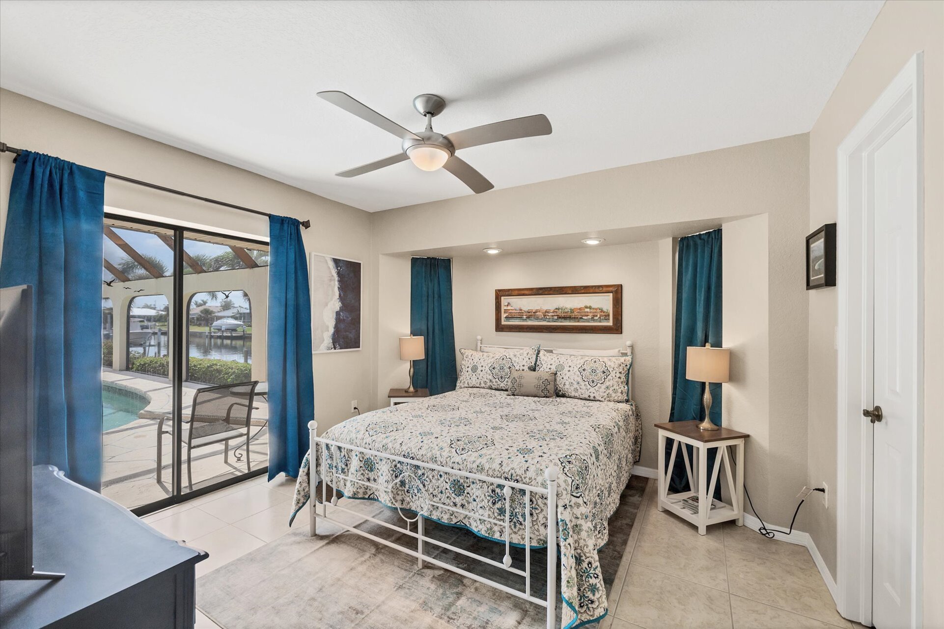 Guest Bedroom with Queen Bed, Lanai Access, and 32" Smart TV